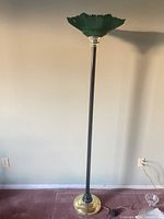 Full view of floor lamp showing height, pole, base, shade