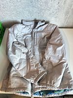 Front view of grey Vancouver 2010 jacket