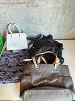 Overall view of four bags on table