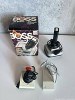 Group view showing both joysticks, Apple control pad and The Boss box