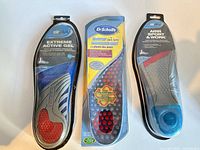 Front view of all three sealed insole packages