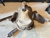 Top view of leather western saddle showing horn, seat and fenders