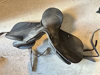 Overhead view of three stacked Wintec saddles