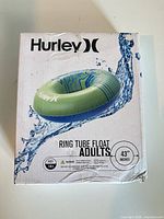 Front of boxed Hurley ring tube float showing branding, size, and intended age