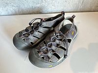 Top view showing both sandals and overall condition