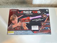 Front of ArmoGear Laser Tag 4 Player Set box showing contents overview