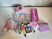 Overview of all nail supplies on table