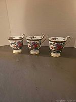 All three Paragon floral teacups front view