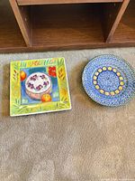 Square Provence plate and blue patterned plate front view