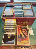 Open box showing numerous opera and classical CD jewel cases