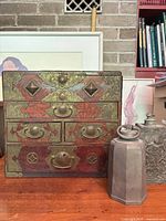 Front view of jewelry chest with both flasks