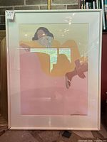 Full view of framed print in white frame and mat