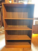 Front view showing shelves and finish