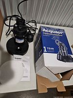 Pump, float switch, foam insert, manual and box overview