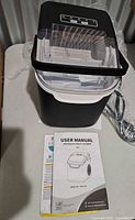 ice maker with basket and manuals