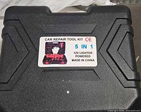 Carry case label showing product name and 12 V lighter power