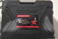 Exterior of black carry case with identification label