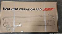 Sealed shipping carton front showing Walking Vibration Pad graphic