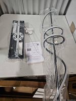 Light fixture components: ceiling canopy, mounting rail, remote, manual, wavy LED bar wrapped