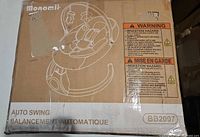 Sealed retail box showing Monamii BB2007 auto swing graphics and labeling
