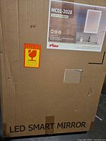 Sealed carton with product label showing model MC01-2028 and brand KAW