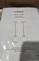 Instruction sheet showing brand, product type and pendant illustration