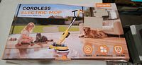 Retail box front showing Qimedo Cordless Electric Mop graphics and features