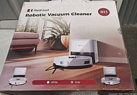 Retail box showing Redroad R11 robotic vacuum cleaner, product imagery and branding