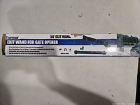 Retail box showing TOPENS 50' Exit Wand for Gate Opener branding and specifications