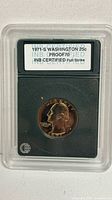 Obverse view of slabbed 1971-S Washington quarter showing INB label