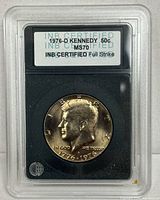 Front of INB slab showing label and coin