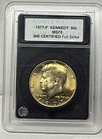 Coin obverse in INB slab showing label and grade