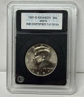 Front of INB slab displaying 1997-D Kennedy Half Dollar and certification label