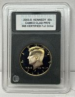 Front of slab showing obverse and certification label