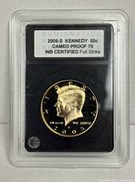 Coin in INB slab front view showing label and grade