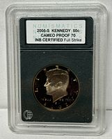 Obverse of 2005-S Kennedy half dollar in INB slab with label visible