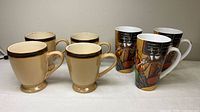 Front view of all seven mugs
