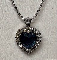 Front view of necklace showing pendant and chain
