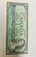 Obverse of banknote showing portrait, serial number P2058600