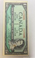 Full obverse view of 1954 $1 banknote showing serial number *1173395