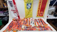Group shot of all pennants laid out and three displayed vertically