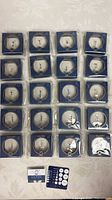 All 20 boxed OUFER labret studs laid out