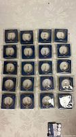 Front view of 20 individually boxed OUFER labret studs