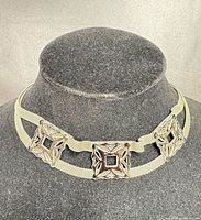 Front view of choker displayed on bust showing overall design