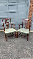 Both Chippendale-style armchairs front view