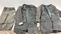 Skirt, closed jacket, jacket opened to show lining