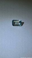 Top view of emerald-cut blue zircon
