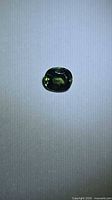 Front view of green oval sapphire