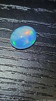 Top view of opal showing body tone and play-of-colour
