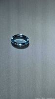 Top view of single Swiss blue topaz oval cabochon